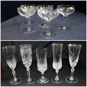 Vintage champagne glasses in different styles of flutes and coupes