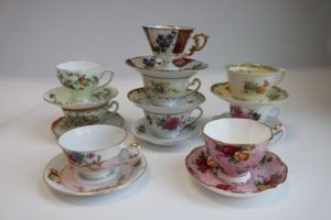 Many one-of-a-kind patterns of vintage tea cups and saucers