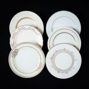 Gold and white/off-white vintage china in mixed coordinated patterns