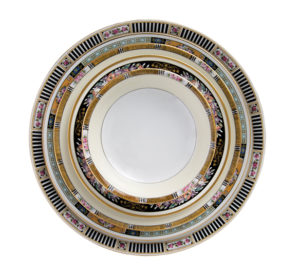 Bold geometric designs featuring black and gold trim with pops of color in vintage china patterns