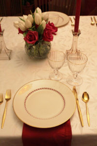 vintage holiday tableware with red and gold color scheme